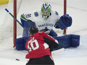 Ottawa Senators left wing Tom Pyatt shoots on Vancouver Canucks goalie Anders Nilsson during first period NHL action Tuesday, October 17, 2017 in Ottawa.