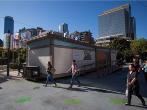 A temporary modular housing suite is visited by the public while on display in Robson Square in downtown Vancouver last month.