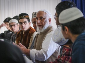 Calgary Imam Syed Soharwardy, centre, founder of Muslims Against Terrorism and the Islamic Supreme Council of Canada, speaks to Muslim youth about anti-radicalization strategies at a mosque Calgary, Alta., Friday, Oct. 6, 2017.