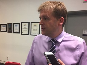 New Westminster Mayor Jonathan Coté speaks to reporters after a Mayors' Council meeting at TransLink headquarters.