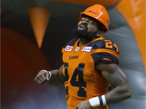 Jeremiah Johnson walks onto the playing field as the B.C. Lions face the Montreal Alouettes in a regular-season CFL game in Vancouver on Sept. 8.