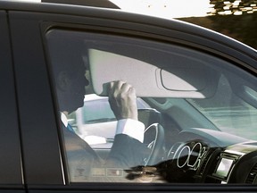 Former Trump campaign chairman Paul Manafort leaves his home in Alexandria, Va., Monday, Oct. 30, 2017, in Washington.