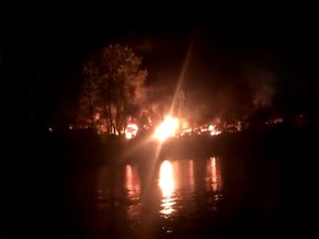 A fire burning on Mitchell Island Thursday evening.
