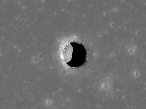 This is a spectacular high-Sun view of the Mare Tranquillitatis pit crater revealing boulders on an otherwise smooth floor. This image from LRO's NAC is 400 metres wide, north is up.