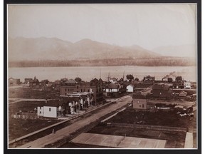 William McFarlane Notman photo of downtown Vancouver from atop the Hotel Vancouver, 1889. This view looks north from Georgia and Granville; the street in front is Howe.