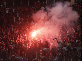 Panama soccer fans celebrate their team's 2-1 victory over Costa Rica at the end of a 2018 Russia World Cup qualifying soccer match in Panama City on Tuesday. Panama is off to the World Cup for the first time.