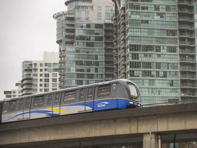 A SkyTrain moves through downtown Vancouver.
