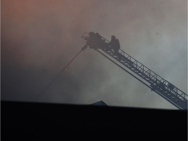 Vancouver Fire Department fighting a two alarm fire on East 3rd Ave between Ontario and Quebec St in Vancouver, BC, Oct. 3, 2017. Nick Procaylo, PNG