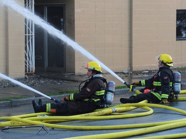 VANCOUVER, BC., October 4, 2017 -- Vancouver Fire Department fighting a two alarm fire on East 3rd Ave between Ontario and Quebec St in Vancouver, BC., October 3, 2017. Several explosions were heard from an Auto repair shop and a Doggie Daycare next door was evacuated with no injuries reported. (NICK PROCAYLO/PostMedia)  00050865A ORG XMIT: 00050865A [PNG Merlin Archive]
Nick Procaylo, PNG