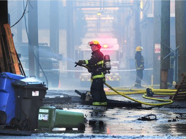 Vancouver Fire Department fighting a two alarm fire on East 3rd Ave between Ontario and Quebec St in Vancouver, BC, Oct. 3, 2017. Nick Procaylo, PNG