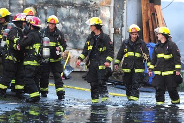 Vancouver Fire Department fighting a two alarm fire on East 3rd Ave between Ontario and Quebec St in Vancouver, BC, Oct. 3, 2017.