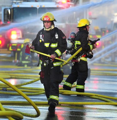 Vancouver Fire Department fighting a two alarm fire on East 3rd Ave between Ontario and Quebec St in Vancouver, BC, Oct. 3, 2017. Nick Procaylo, PNG