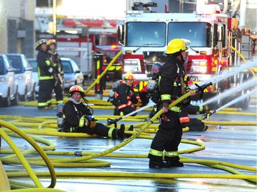 VANCOUVER, BC., October 4, 2017 -- Vancouver Fire Department fighting a two alarm fire on East 3rd Ave between Ontario and Quebec St in Vancouver, BC., October 3, 2017. Several explosions were heard from an Auto repair shop and a Doggie Daycare next door was evacuated with no injuries reported. (NICK PROCAYLO/PostMedia)  00050865A ORG XMIT: 00050865A [PNG Merlin Archive]
Nick Procaylo, PNG