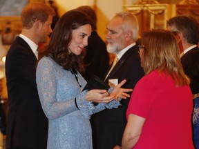 Britain's Catherine, Duchess of Cambridge takes part in a reception at Buckingham Palace to celebrate World Mental Health Day in London on Oct. 10, 2017.