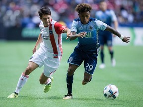 Vancouver Whitecaps coach Carl Robinson says the key to beating the San Jose Earthquakes in MLS playoff action Wednesday will be for his big players like Yordy Reyna, right, to step up big time.