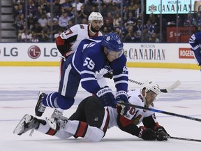 Andreas Borgman of the Toronto Maple Leafs works against the Ottawa Senators in a preseason game.