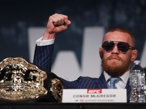 Conor McGregor reacts during the UFC 205 news conference at The Theater at Madison Square Garden on Sept. 27, 2016, in New York.