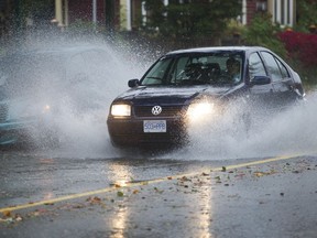 A flooded intersection at 4th Avenue and Victoria Drive in Vancouver earlier this week.