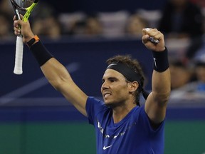 Rafael Nadal of Spain celebrates after winning his men's semifinals match against Marin Cilic of Croatia in the Shanghai Masters tennis tournament at Qizhong Forest Sports City Tennis Center in Shanghai, China, Saturday, Oct. 14, 2017. (AP Photo/Andy Wong)