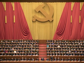 Chinese President Xi Jinping, bottom centre, presides over the opening ceremony of the 19th Party Congress held at the Great Hall of the People in Beijing Wednesday, Oct. 18, 2017.