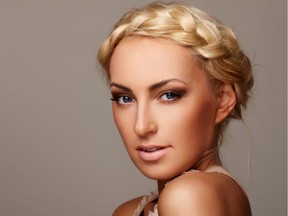 A braid crown is a simple, chic hairstyle to try at home for the holiday party season.
