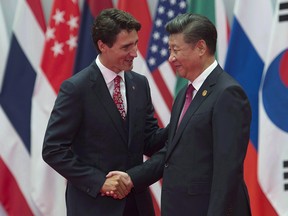 Canadian Prime Minister Justin Trudeau is greeted by Chinese President Xi Jinping during the official welcome at the G20 Leaders Summit in Hangzhou on Sept. 4, 2016.