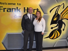 Frank Hurt Secondary principal Mike Stickley (left) with Ashley Bouchard, general manager of Raven Hydronic Supply, a Surrey company that provides emergency funding for students at the school.