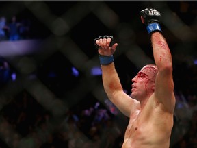 Georges St-Pierre of Canada celebrates his victory over Michael Bisping of England in their UFC middleweight championship bout during the UFC 217 event at Madison Square Garden on November 4, 2017 in New York City. (Photo by Mike Stobe/Getty Images) ORG XMIT: 775036331 Mike Stobe, Getty Images