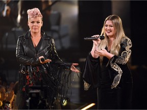 Pink (left) and Kelly Clarkson perform onstage during the 2017 American Music Awards at Microsoft Theater on Nov. 19, 2017 in Los Angeles, California.
