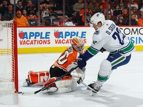 Daniel Sedin scores at 9:42 of the first period against Flyers goalie Michal Neuvirth Philadelphia Flyers at the Wells Fargo Center on Nov. 21, 2017.