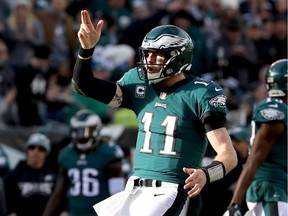 Quarterback Carson Wentz of the Philadelphia Eagles celebrates his first-down carry during a Nov. 26, 2017 NFL game against the Chicago Bears at Lincoln Financial Field in Philadelphia.
