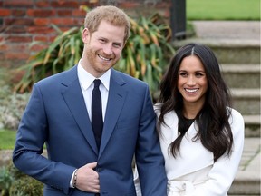 Prince Harry and actress Meghan Markle during an official photo call to announce their engagement at The Sunken Gardens at Kensington Palace on Nov. 27 in London, England. Prince Harry and Markle have been a couple officially since November 2016 and are due to marry in spring 2018.