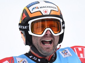 Canada's Manuel Osborne-Paradis celebrates in the finish area of the men's Super-G race at the 2017 FIS Alpine World Ski Championships in St. Moritz on February 8, 2017.
