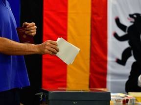 A voter casts his ballot in Berlin in September.