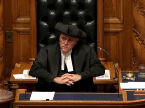 FILE PHOTO - Speaker of the legislature Darryl Plecas looks on as B.C. Finance Minister Carole James delivers the budget from the legislative assembly at Legislature in Victoria, B.C., on Monday, September 11, 2017.