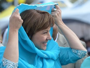 When ex-BC Premier Christy Clark stopped attending the Pride parade in 2012 and began burnishing her conservative moral and religious image, her popularity jumped, a new book says. (Photo: Clark at annual Vaisakhi parade in Surrey.)