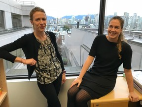 Kirstie McRae, left, and Carling Watson, community partnerships coordinators with Diabetes Canada, share a few lighter moments in their busy Vancouver office on Tuesday.
