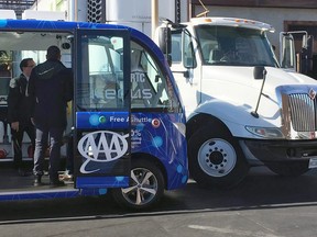 This photo by KVVU reporter Kathleen Jacob shows a driverless shuttle bus after it collided with a big rig in Las Vegas Wednesday, Nov. 8, 2017, less than two hours after the automated ride service was launched. Police say no injuries were reported. It's not yet clear what caused the wreck.