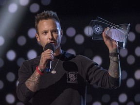 Dallas Smith accepts the award for single of the year at the Canadian Country Music Association Awards in Saskatoon on Sept. 10, 2017.