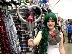 Twitter users @DALee74 snapped this photo of a cosplay fan dressed as Sailor Pluto at the Fan Expo Vancouver.