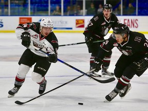 James Malm (l) scored twice for the Giants against the Rebels on Wednesday night.