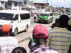 Guyana police investigate murder in Georgetown in July 2017.
