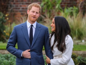 Prince Harry and Meghan Markle attend a photo call at Kensington Palace to mark their engagement