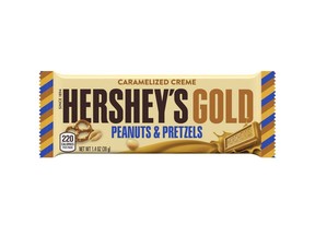 This image released by The Hershey Company shows their new candy bar Hershey's Gold that will go on sale Dec. 1, 2017. It's described as a caramelized cream bar embedded with salty peanut and pretzel bits. (The Hershey Company via AP) ORG XMIT: NYAG405

AP PROVIDES ACCESS TO THIS THIRD PARTY PHOTO SOLELY TO ILLUSTRATE NEWS REPORTING OR COMMENTARY ON FACTS DEPICTED IN IMAGE; MUST BE USED WITHIN 14 DAYS FROM TRANSMISSION; NO ARCHIVING; NO LICENSING; MANDATORY CREDIT
AP