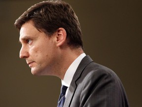 FILE PHOTO - Attorney General David Eby speaks to media during a press conference at Legislature in Victoria, B.C., on September 18, 2017.