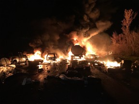Two fuel tankers and at least three transport trucks were involved in a fiery crash in the northbound lanes of Highway 400, south of Barrie, Ont.