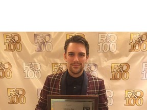 Port Alberni's Foster Coulson holds a plaque that recognizes his company's IceStorm90 as one of the 100 most technologically significant new products of the year by R&D Magazine.