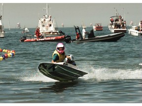 Richard Mellis of Vancouver powers his way ashore to win the 30th annual Nanaimo to Vancouver International World Championship Bathtub Race in 1996.