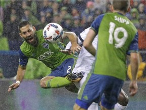 Clint Dempsey (left) scored twice for the Sounders at Seattle's CenturyLink Field as the home side won 2-0 to advance to the MLS Western Conference finals.