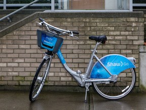 The city of Vancouver its Mobi by Shaw Go bike sharing program to Commercial Drive.  [PNG Merlin Archive]
Handout, PNG